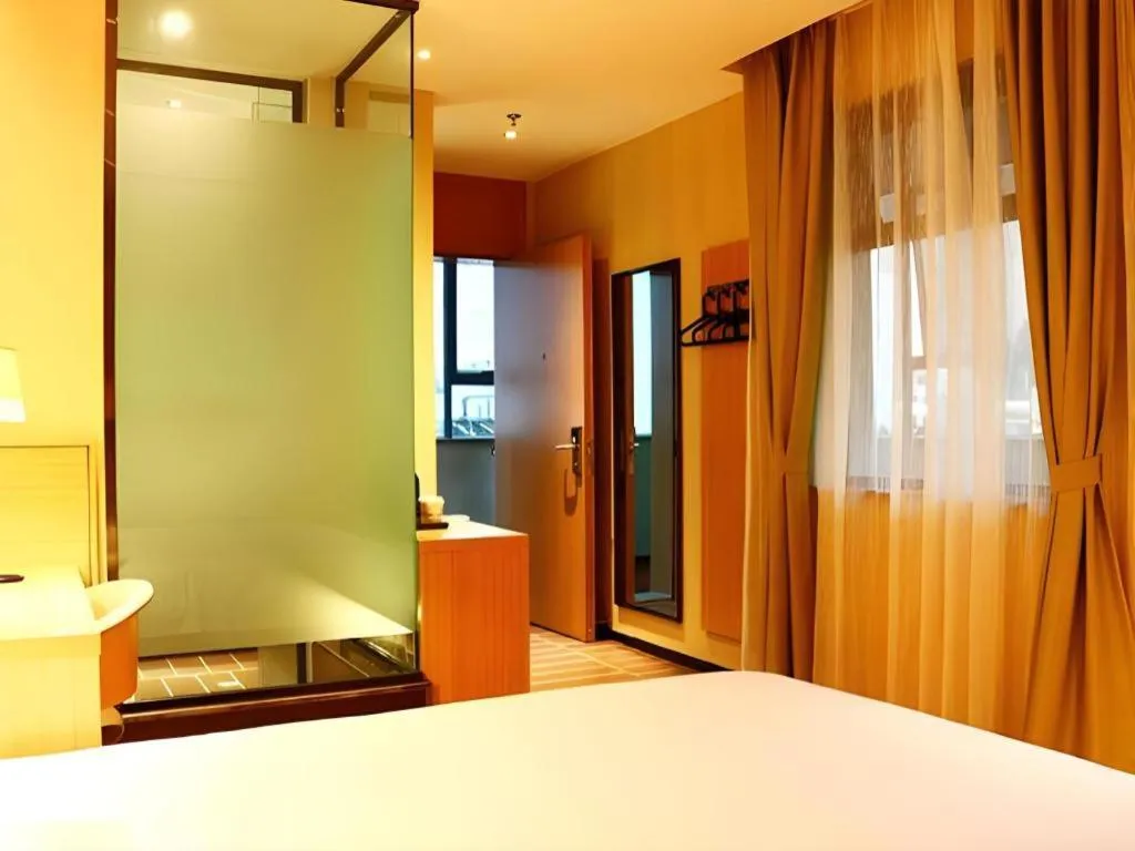 Bed in IU Hotel Kunming Jinma Bijifang Joy City