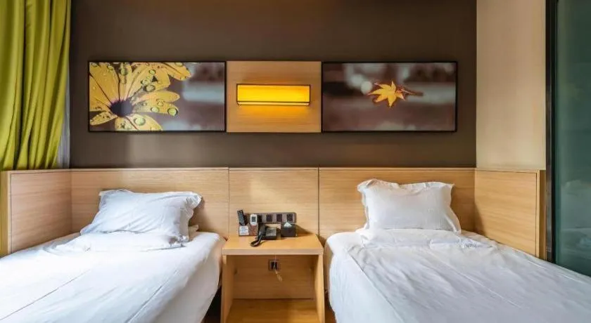 Bed in IU Hotel Kunming Jinma Bijifang Joy City