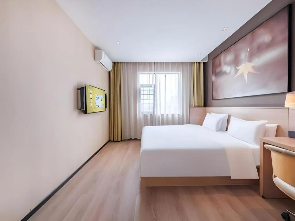 Bed in IU Hotel Kunming Jinma Bijifang Joy City