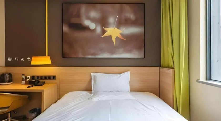 Bed in IU Hotel Kunming Jinma Bijifang Joy City