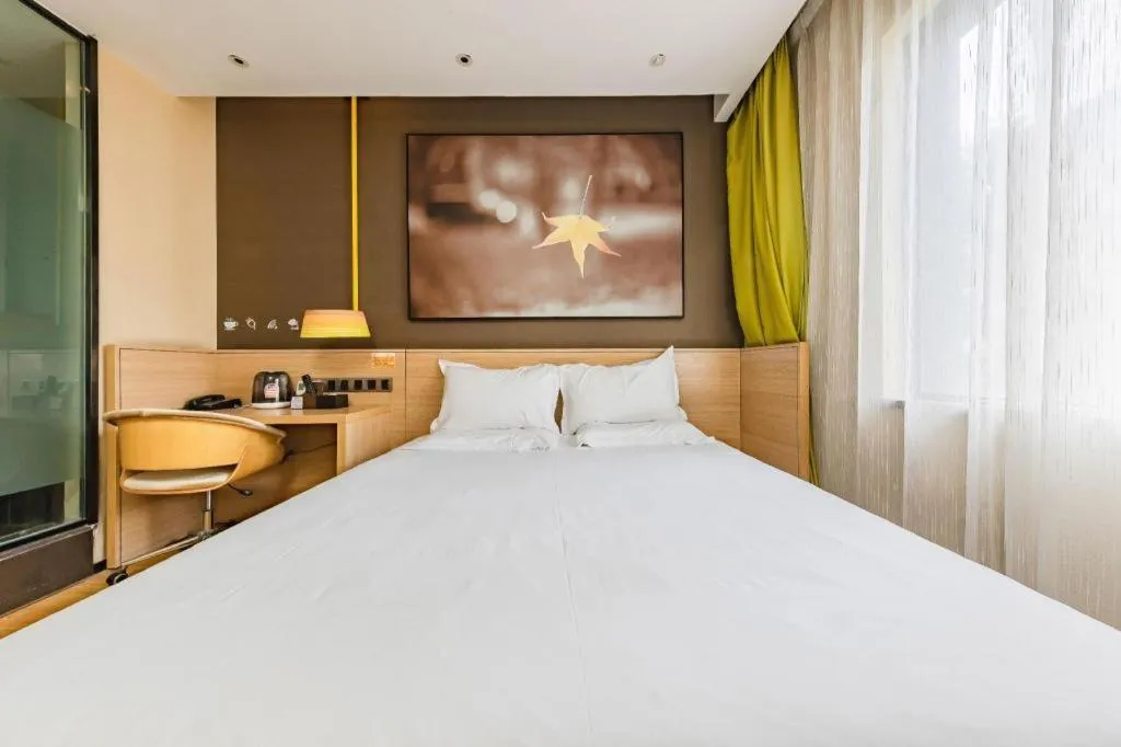 Bed in IU Hotel Kunming Jinma Bijifang Joy City