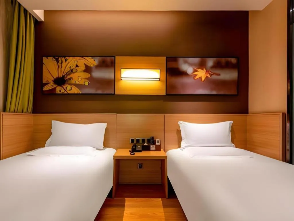 Bed in IU Hotel Kunming Jinma Bijifang Joy City