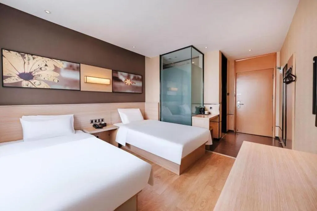 Bed in IU Hotel Kunming Jinma Bijifang Joy City