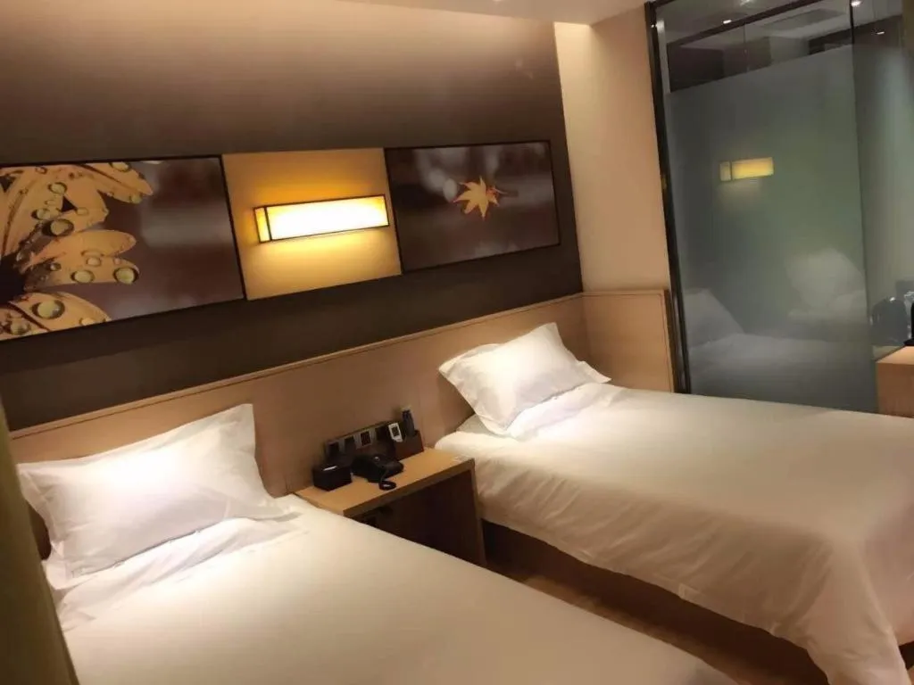 Bed in IU Hotel Kunming Jinma Bijifang Joy City