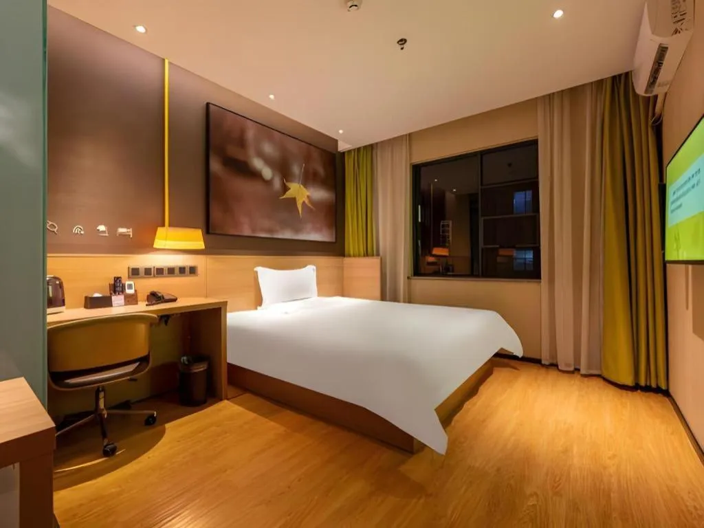 Bed in IU Hotel Kunming Jinma Bijifang Joy City