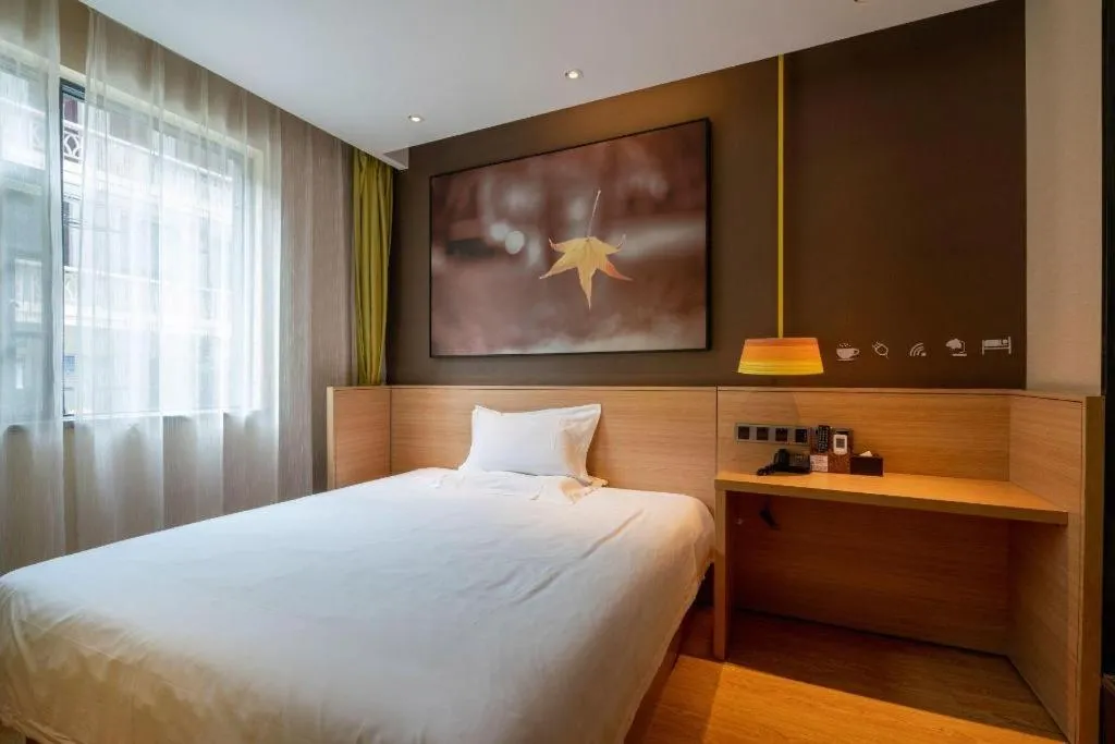 Bed in IU Hotel Kunming Jinma Bijifang Joy City