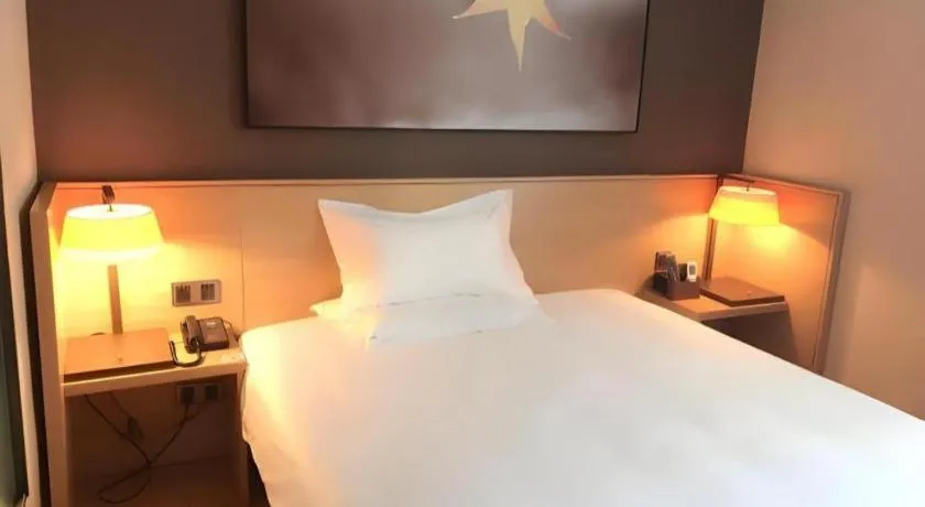 Bed in IU Hotel Kunming Jinma Bijifang Joy City