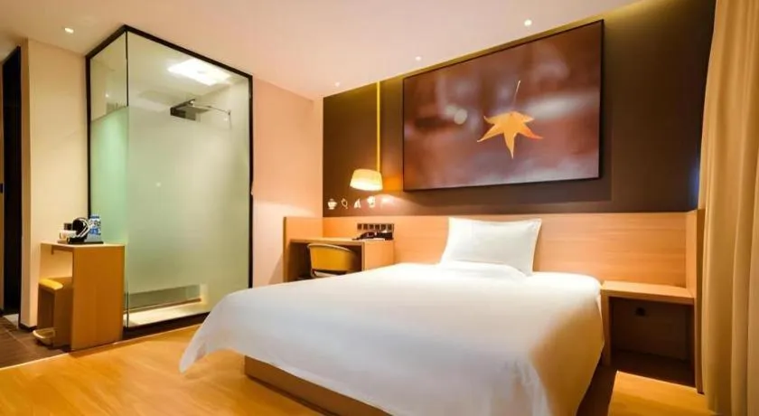 Bed in IU Hotel Kunming Jinma Bijifang Joy City