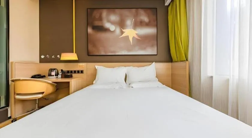 Bed in IU Hotel Kunming Jinma Bijifang Joy City