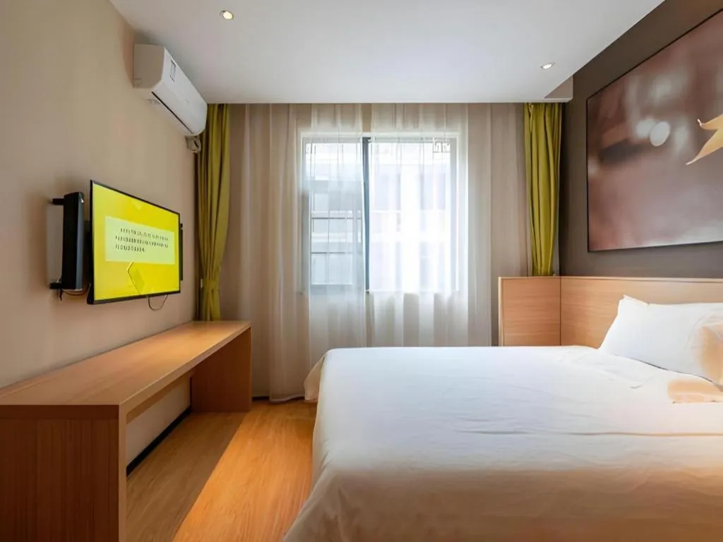 Bed in IU Hotel Kunming Jinma Bijifang Joy City