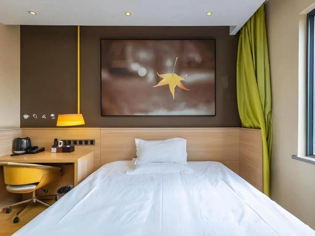 Bed in IU Hotel Kunming Jinma Bijifang Joy City