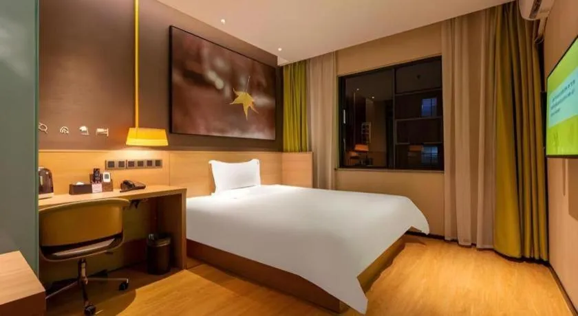 Bed in IU Hotel Kunming Jinma Bijifang Joy City