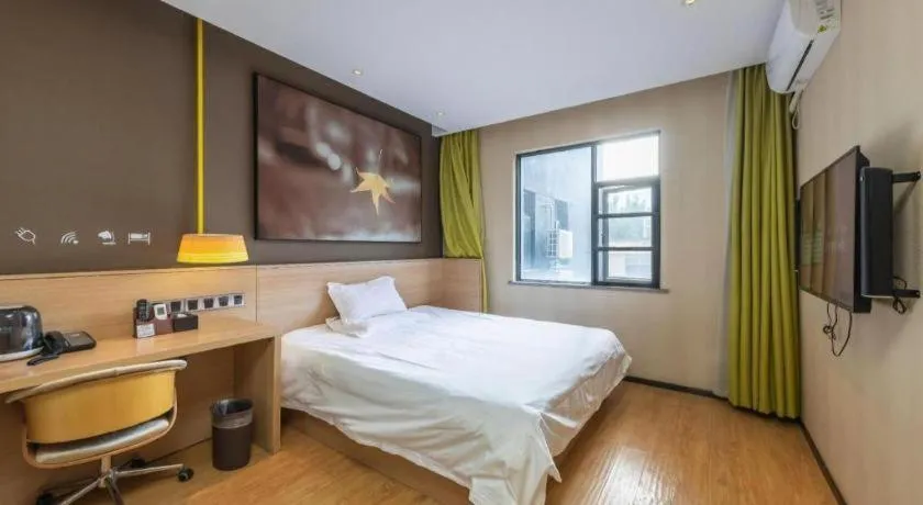 Bed in IU Hotel Kunming Jinma Bijifang Joy City