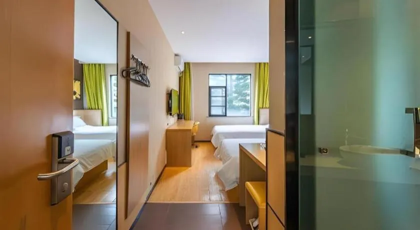 Bed in IU Hotel Kunming Jinma Bijifang Joy City