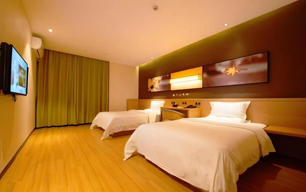 Bed in IU Hotel Kunming Jinma Bijifang Joy City