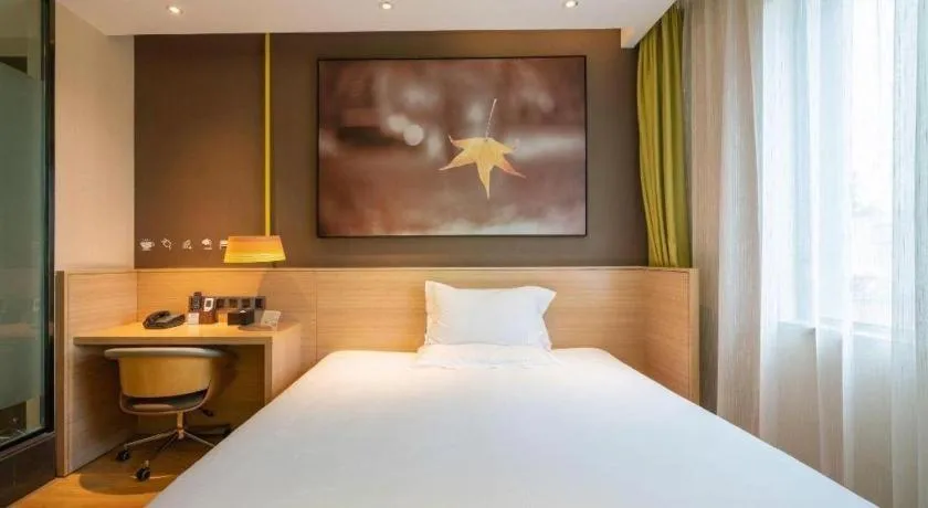 Bed in IU Hotel Kunming Jinma Bijifang Joy City