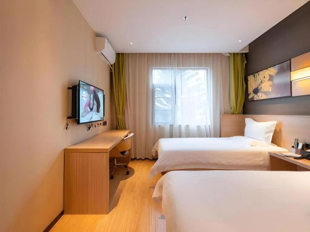 Bed in IU Hotel Kunming Jinma Bijifang Joy City