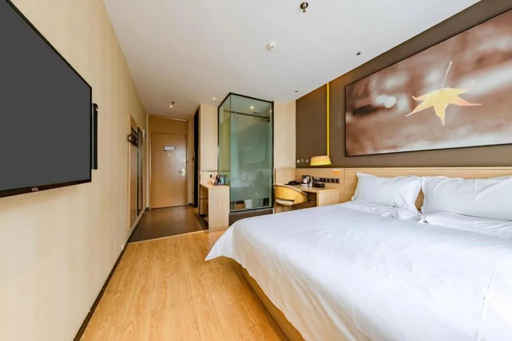 Bed in IU Hotel Kunming Jinma Bijifang Joy City