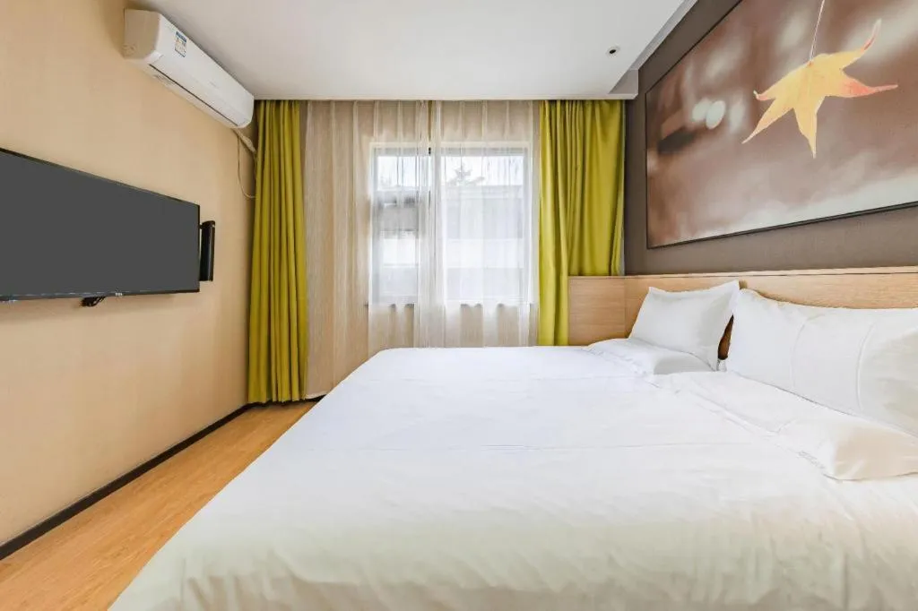 Bed in IU Hotel Kunming Jinma Bijifang Joy City