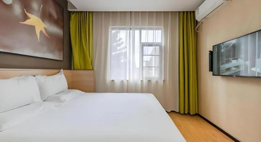 Bed in IU Hotel Kunming Jinma Bijifang Joy City