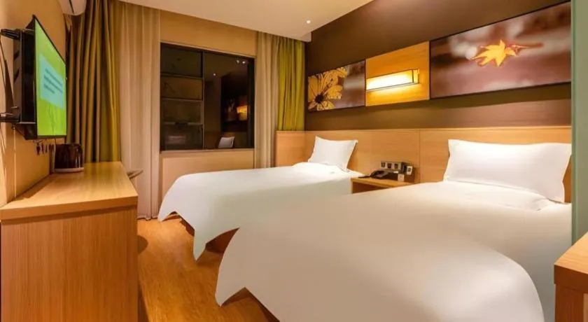 Bed in IU Hotel Kunming Jinma Bijifang Joy City