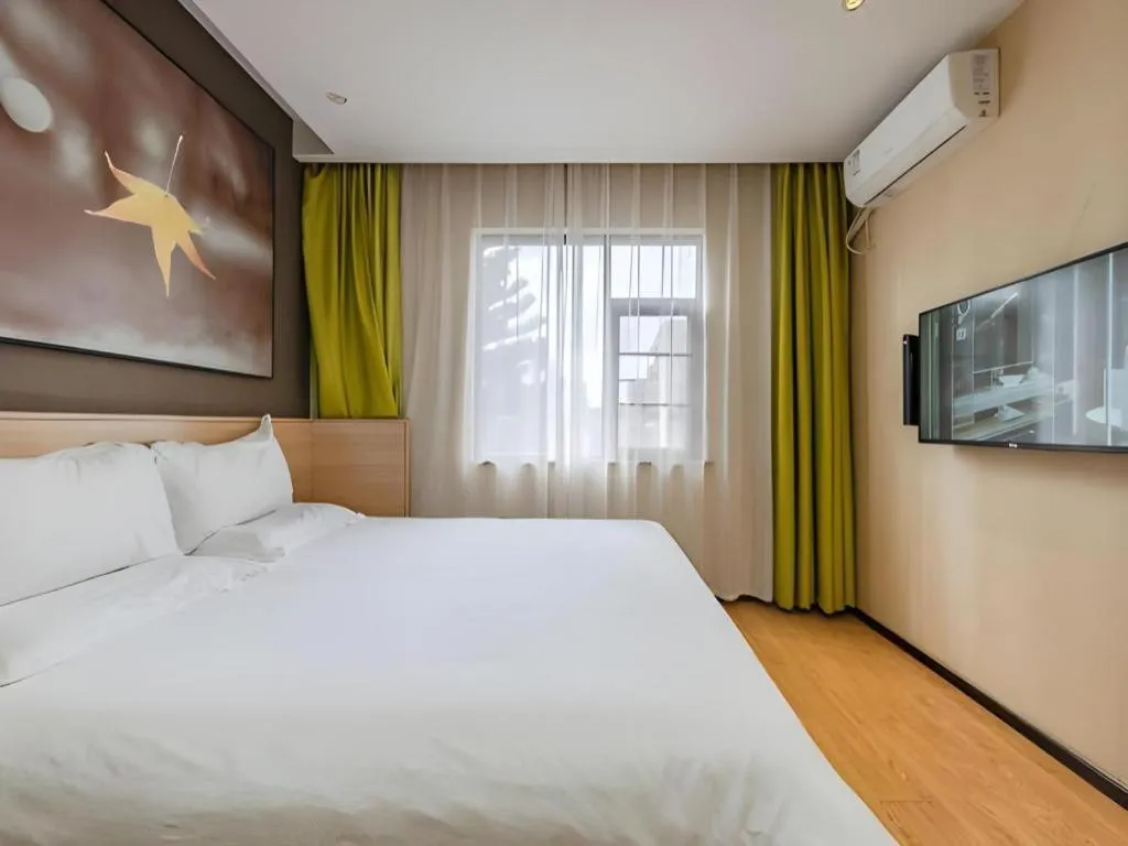 Bed in IU Hotel Kunming Jinma Bijifang Joy City