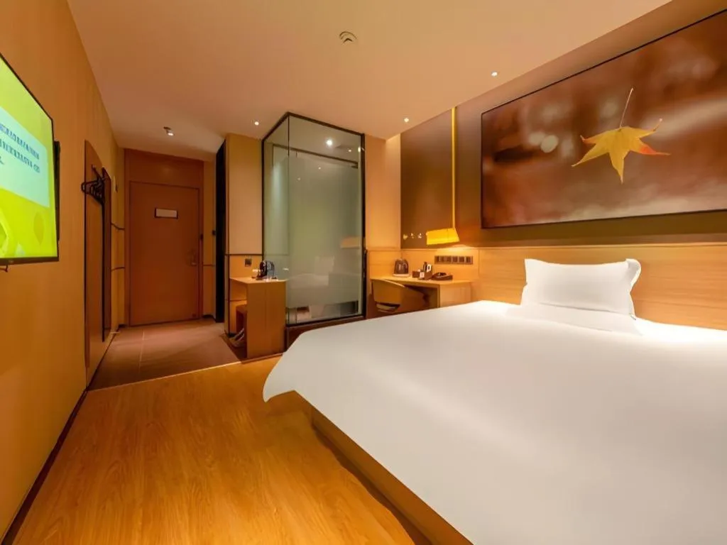 Bed in IU Hotel Kunming Jinma Bijifang Joy City