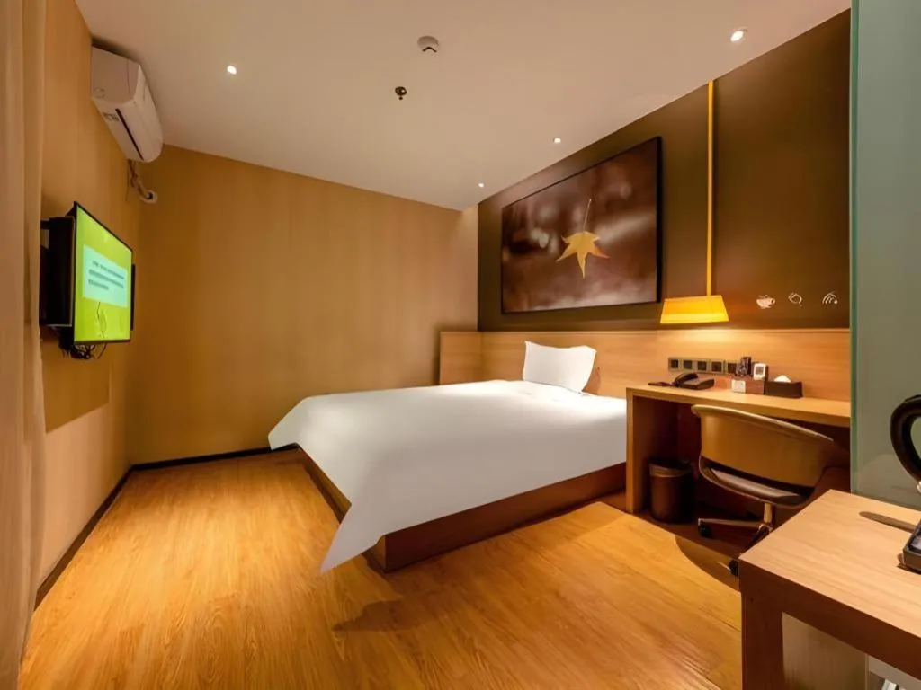 Bed in IU Hotel Kunming Jinma Bijifang Joy City