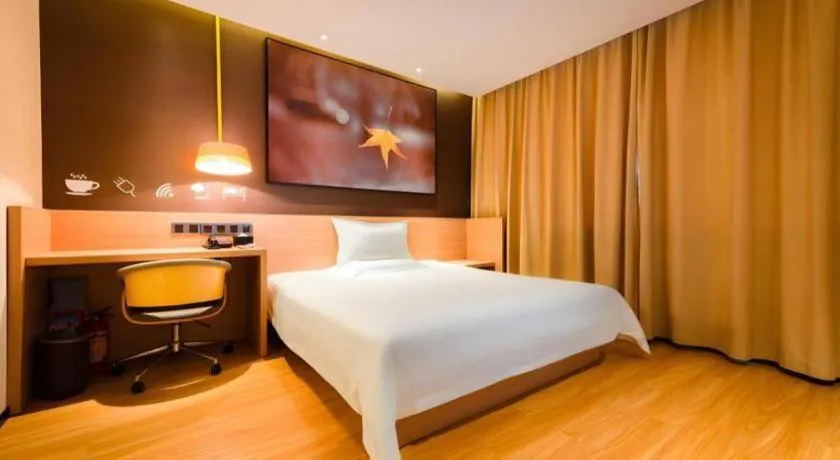 Bed in IU Hotel Kunming Jinma Bijifang Joy City