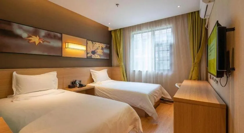 Bed in IU Hotel Kunming Jinma Bijifang Joy City