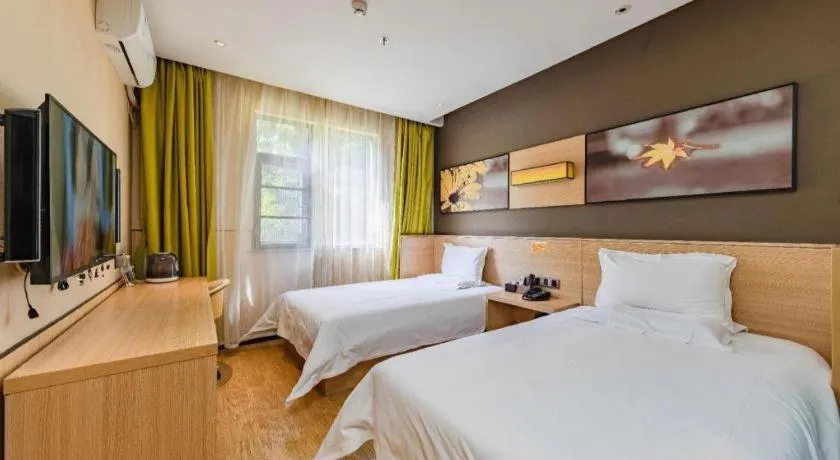 Bed in IU Hotel Kunming Jinma Bijifang Joy City