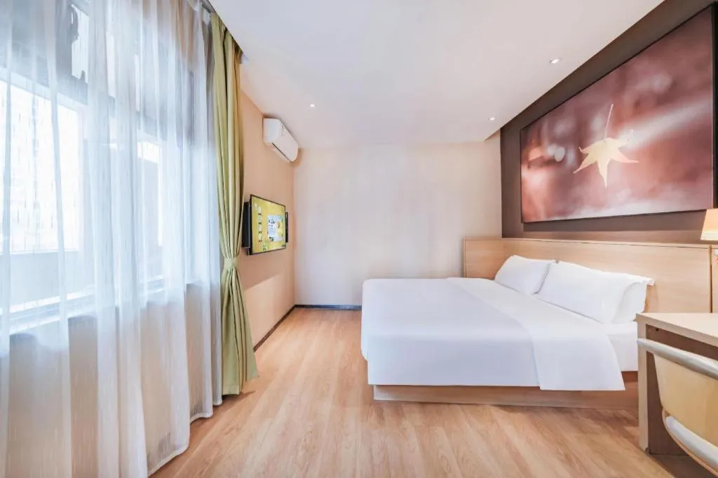 Bed in IU Hotel Kunming Jinma Bijifang Joy City