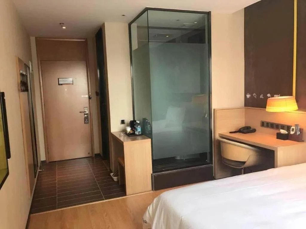 Bed in IU Hotel Kunming Jinma Bijifang Joy City