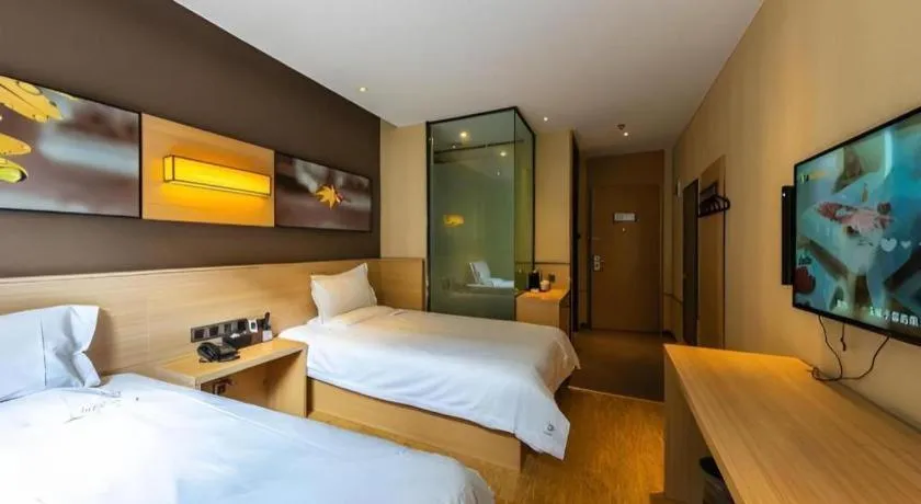 Bed in IU Hotel Kunming Jinma Bijifang Joy City