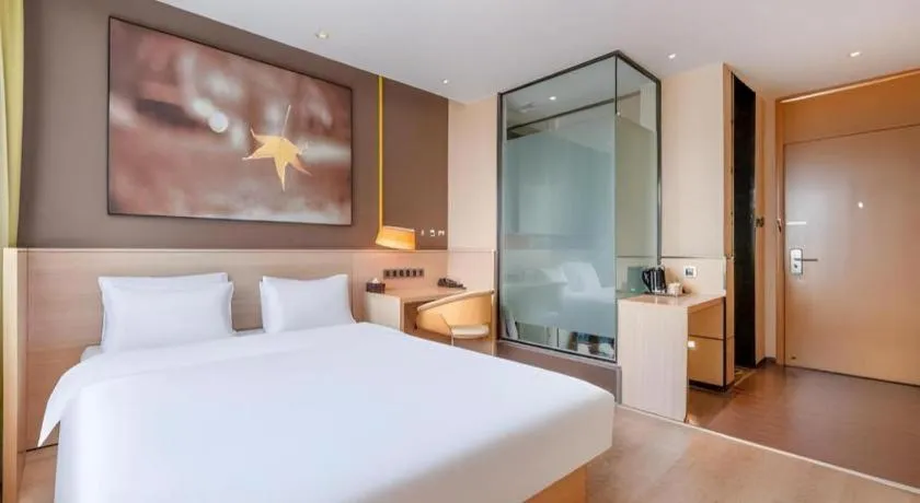 Bed in IU Hotel Kunming Jinma Bijifang Joy City