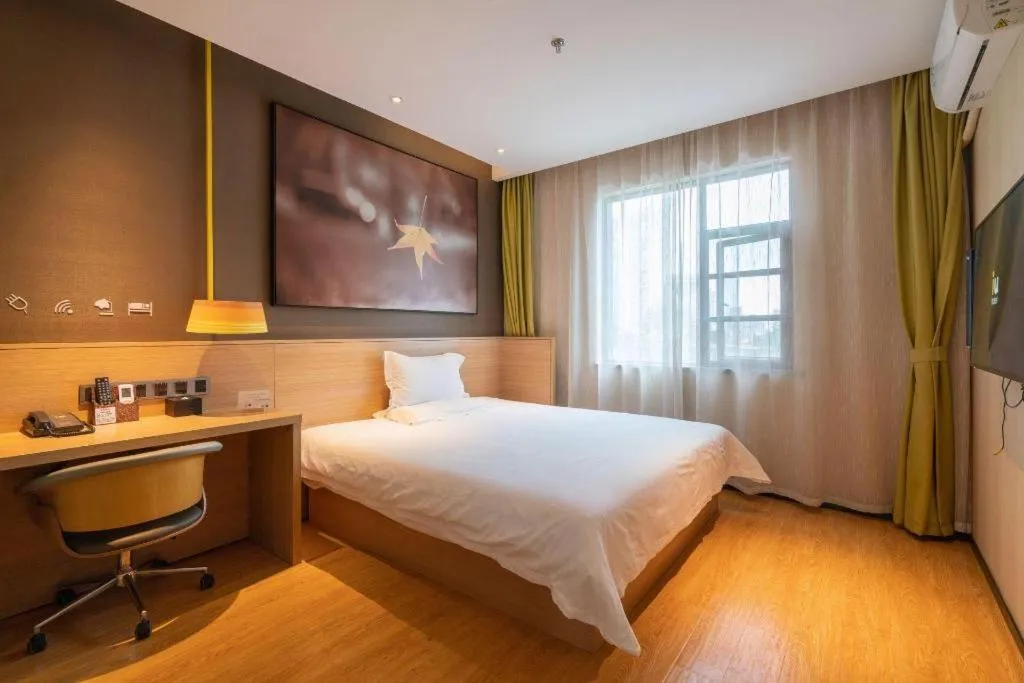 Bed in IU Hotel Kunming Jinma Bijifang Joy City