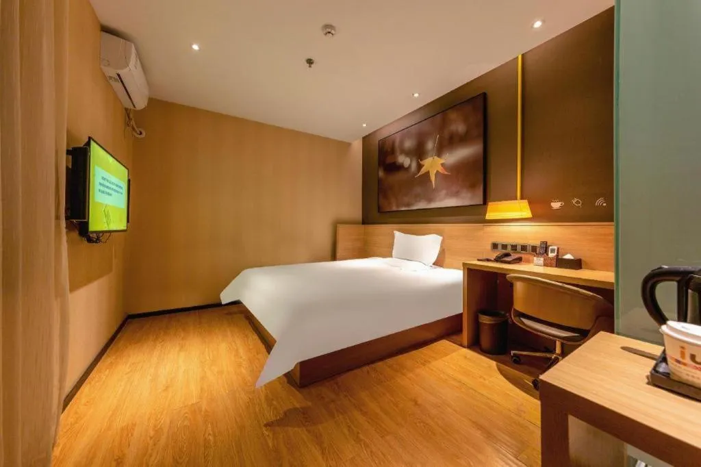 Bed in IU Hotel Kunming Jinma Bijifang Joy City