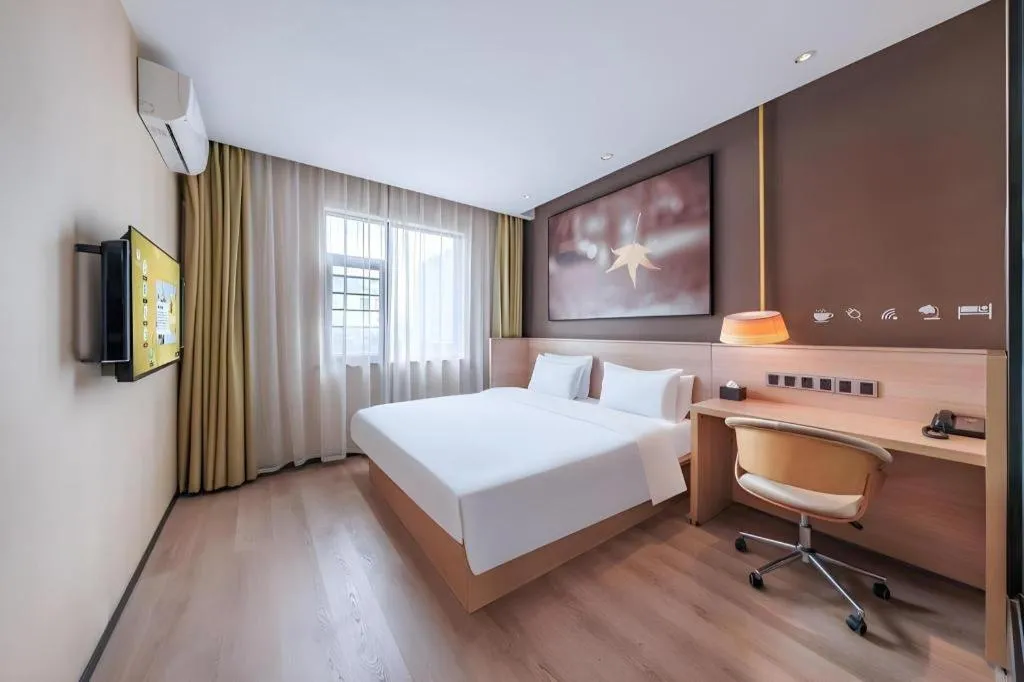 Bed in IU Hotel Kunming Jinma Bijifang Joy City