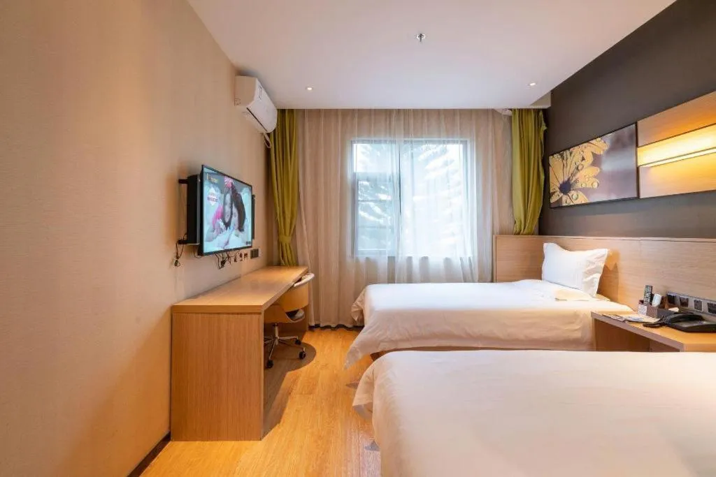 Bed in IU Hotel Kunming Jinma Bijifang Joy City