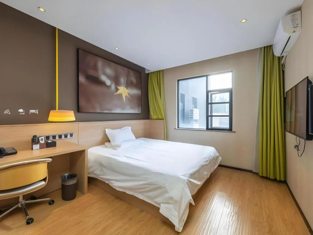 Bed in IU Hotel Kunming Jinma Bijifang Joy City