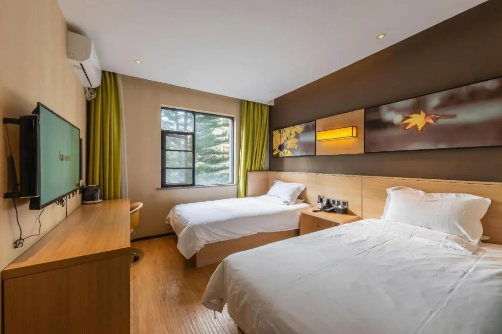 Bed in IU Hotel Kunming Jinma Bijifang Joy City