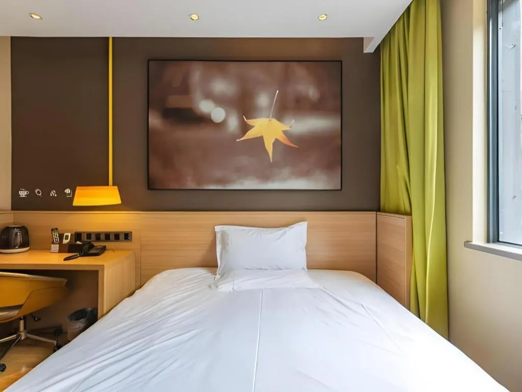 Bed in IU Hotel Kunming Jinma Bijifang Joy City