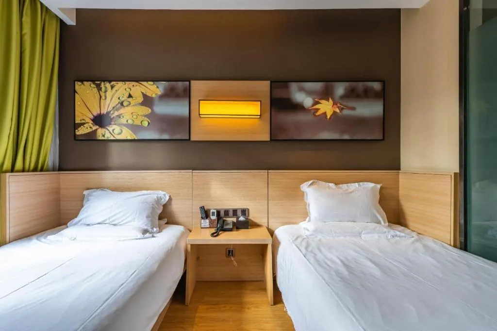 Bed in IU Hotel Kunming Jinma Bijifang Joy City