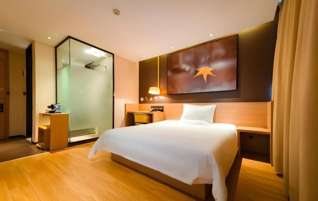 Bed in IU Hotel Kunming Jinma Bijifang Joy City