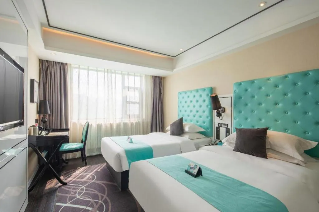 Bed in Xana Hotelle·JiNan Daminghu East Gate Shandong University