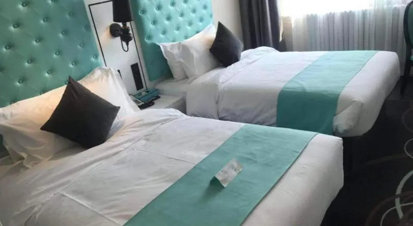 Bed in Xana Hotelle·JiNan Daminghu East Gate Shandong University