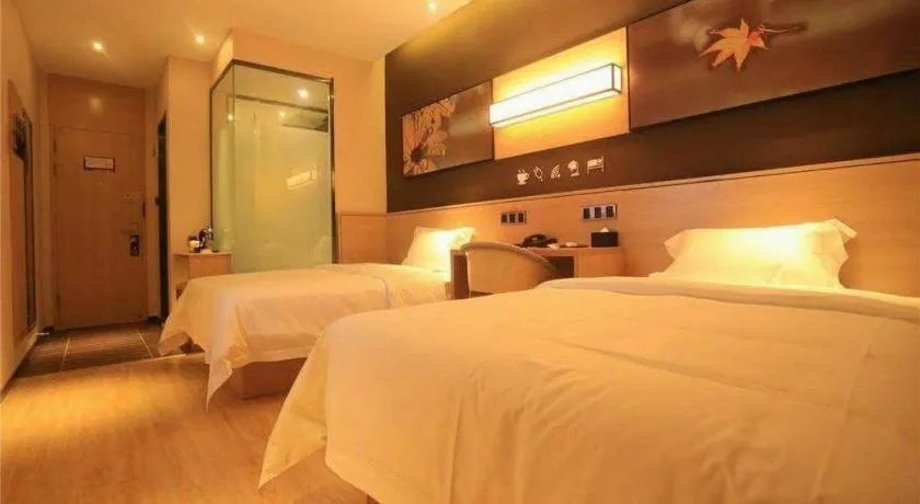 Bed in IU Hotels Xinzhou Bus Terminal