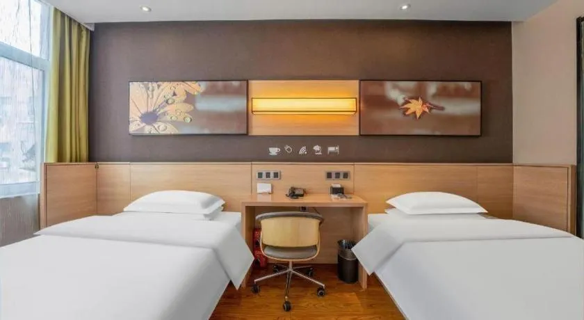 Bed in IU Hotels Xinzhou Bus Terminal