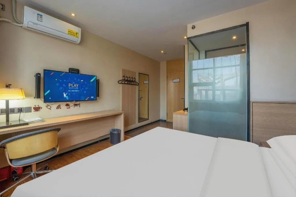 Bed in IU Hotels Xinzhou Bus Terminal