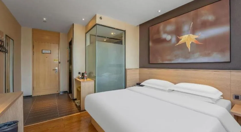 Bed in IU Hotels Xinzhou Bus Terminal